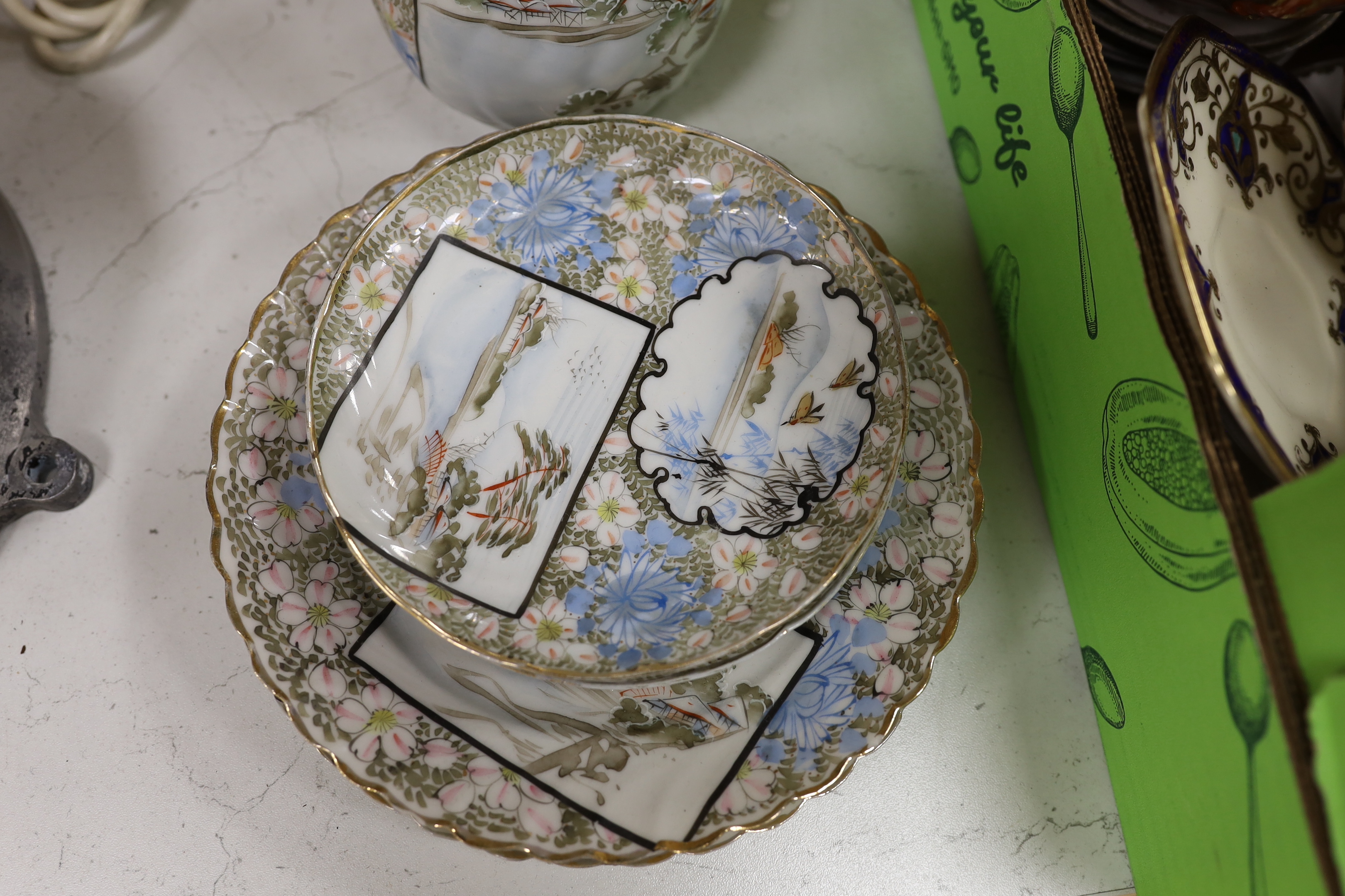 A group of Japanese ceramics, possibly Meiji including a teapot, a miniature Kutani vase and Japanese fluted bowls, etc., largest 21cm in diameter, a Japanese Satsuma lamp base and a pot and cover, possibly Meiji period,